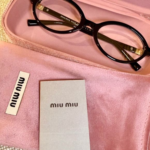 Miu Miu Accessories - Miu Miu Dark black Glasses for Women